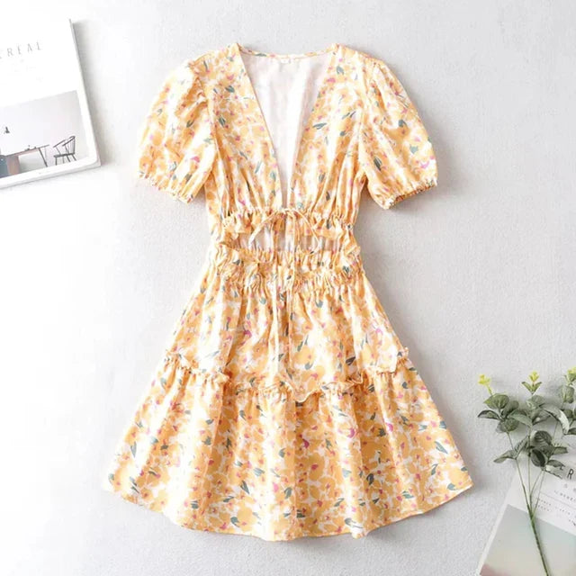 Delilah | Sonniger Blumen-Romper mit Bindungsdetail vorn